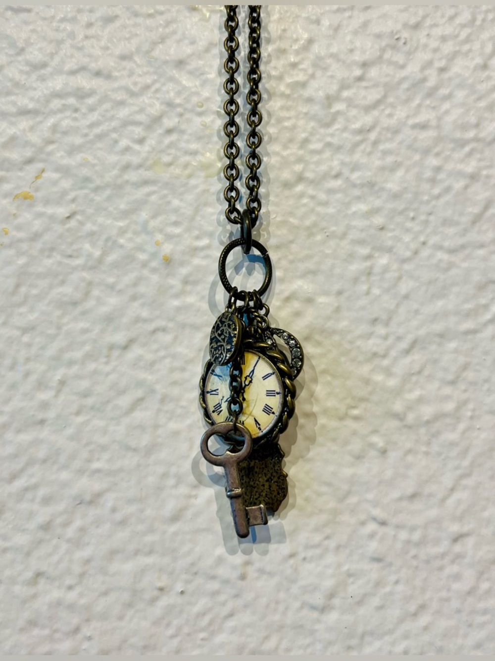 Claire’s Antique-Style Brass Key and Watch Charm Necklace